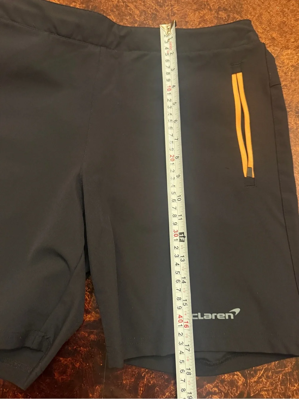 Castore x McLaren Men's Black Athletic Shorts with Yellow Zip Accents